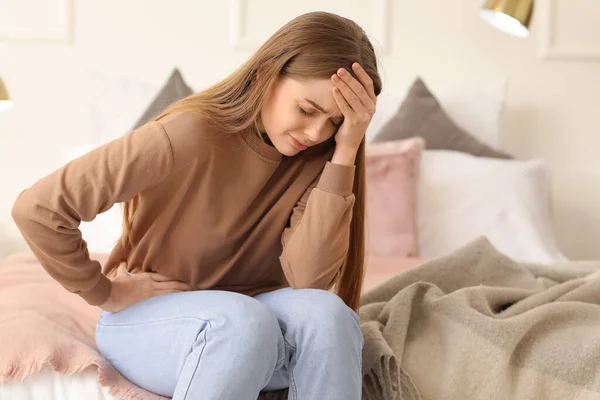 Young Woman Appendicitis Sitting Bed Home — Stock Photo, Image
