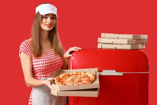 Young Woman Tasty Pizza Fridge Red Background — Stock Photo, Image