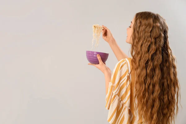 Young Woman Bowl Chinese Noodles Light Background — Stock Photo, Image