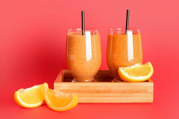 Board Glasses Healthy Orange Smoothie Red Background — Stock Photo, Image