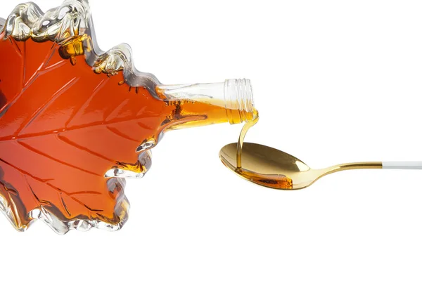 Pouring Tasty Maple Syrup Bottle Spoon White Background Closeup — Stok fotoğraf