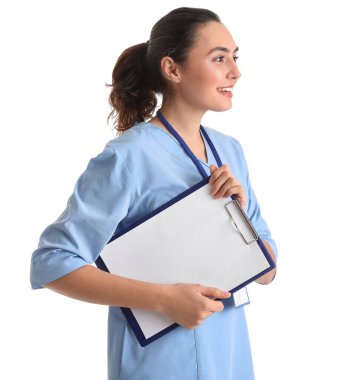 Female medical assistant with clipboard on white background