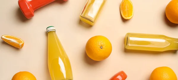 Fresh Oranges Bottles Juice Dumbbells Beige Background Diet Concept — Stock Photo, Image