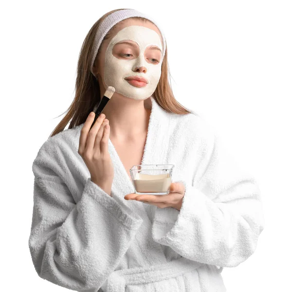 Young Woman Applying Turmeric Mask Brush White Background — Stock Fotó