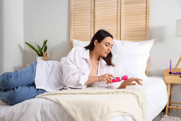Young Woman Vibrator Lying Bed Home — Stock Photo, Image