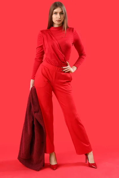 Pretty Stylish Young Woman Red Background — стоковое фото