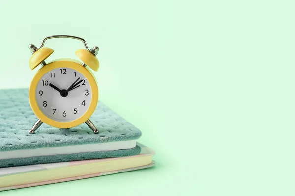 Notebooks Alarm Clock Color Background — Stock Photo, Image
