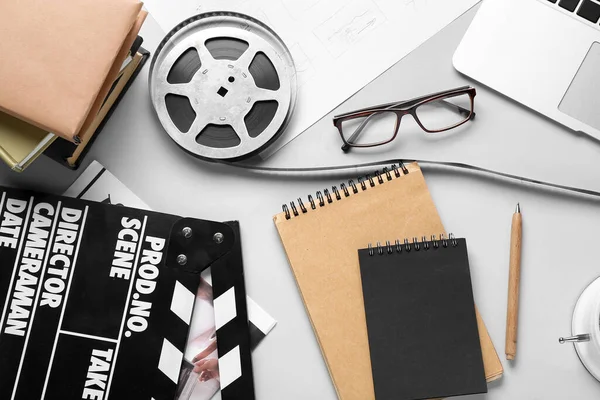 Notebooks Film Reel Movie Clapper Grey Background — Stock Photo, Image