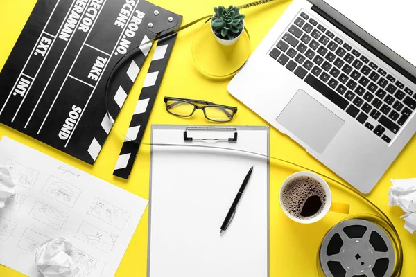 Clipboard Movie Clapper Film Reel Cup Coffee Laptop Yellow Background — Stock Photo, Image