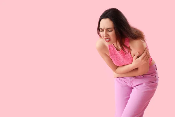 Young Woman Suffering Menstrual Cramps Pink Background — Foto Stock