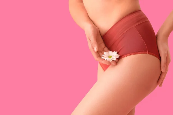 Young Woman Menstrual Panties Daisy Flower Pink Background Closeup — стоковое фото