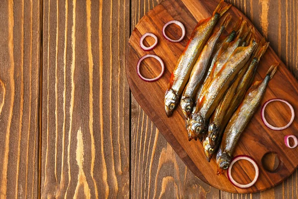 Board Delicious Smoked Capelin Wooden Background — Stock Photo, Image