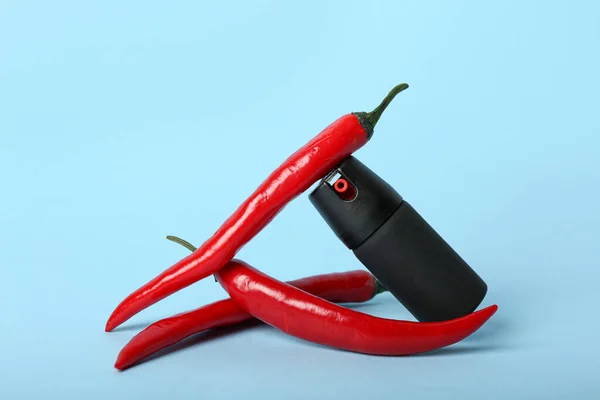 Spray Chili Peppers Blue Background — Stock Photo, Image