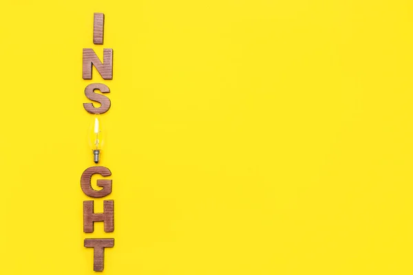 Word Insight Light Bulb Yellow Background — Stock Photo, Image