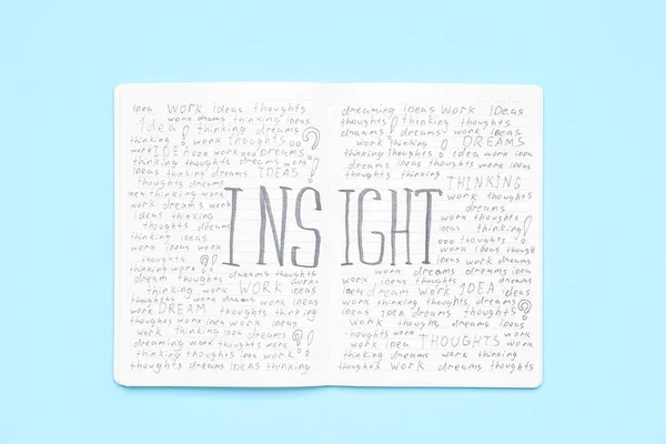Notebook Word Insight Blue Background — Stock Photo, Image