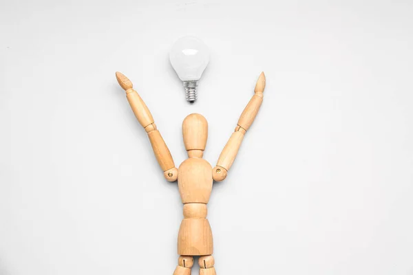 Wooden Mannequin Light Bulb Light Background Insight Concept — Stock Photo, Image