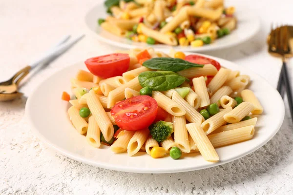 Plates Tasty Pasta Salad Light Background Closeup — Stock Photo, Image