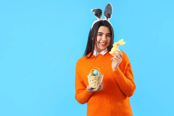 Young Woman Bunny Ears Basket Easter Eggs Toy Blue Background — Stock Photo, Image