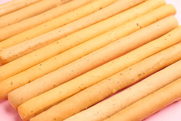 Tasty Italian Grissini Pink Background Closeup — Stock Photo, Image