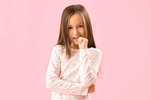 Little Girl Biting Nails Pink Background — Stok fotoğraf
