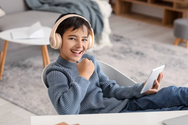 Happy Little Boy Headphones Using Tablet Computer Home — Stock Photo, Image