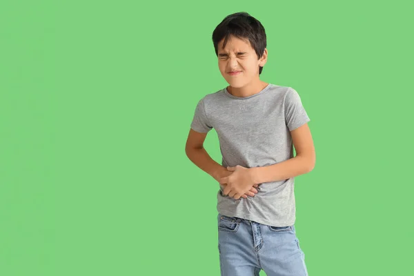Little Boy Appendicitis Green Background —  Fotos de Stock