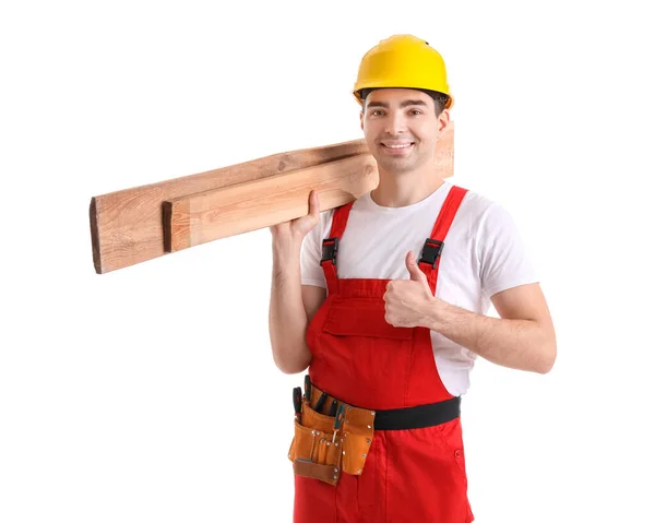 年轻的木匠 有木制木板 有白色背景的大拇指 — 图库照片