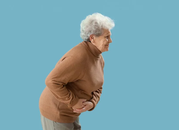 Senior Woman Appendicitis Green Background — Stock Photo, Image
