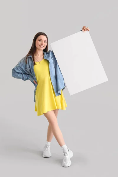 Young Woman Big Blank Poster Grey Background — Stock Photo, Image