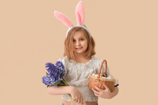 Little Girl Bunny Ears Basket Easter Eggs Flowers Beige Background — Stock Photo, Image