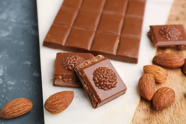 Board Tasty Chocolate Almond Nuts Table Closeup — Stock Photo, Image