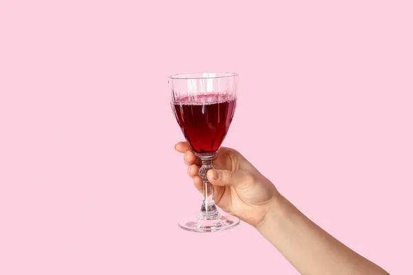 Female Hand Holding Glass Red Wine Pink Background — Stock Photo, Image