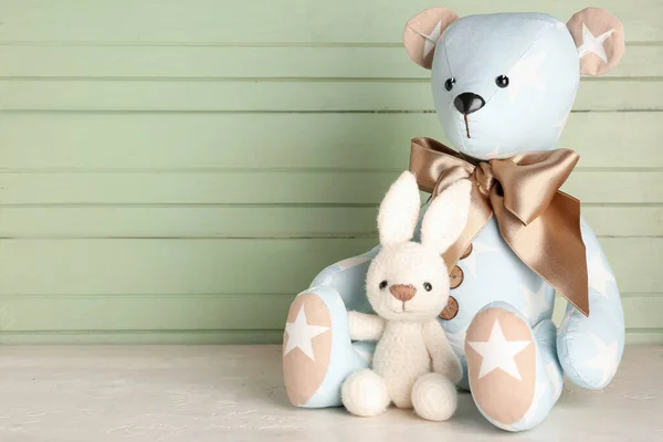 Toy Bear Bunny Table Green Wooden Wall — Stock Photo, Image