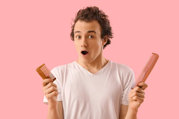 Shocked Young Man Hair Loss Problem Combs Pink Background — Stock Photo, Image