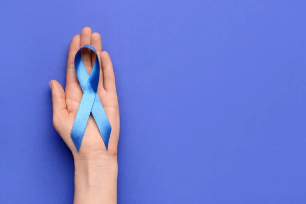 Female Hand Blue Awareness Ribbon Color Background Closeup Prostate Cancer — Stock Photo, Image