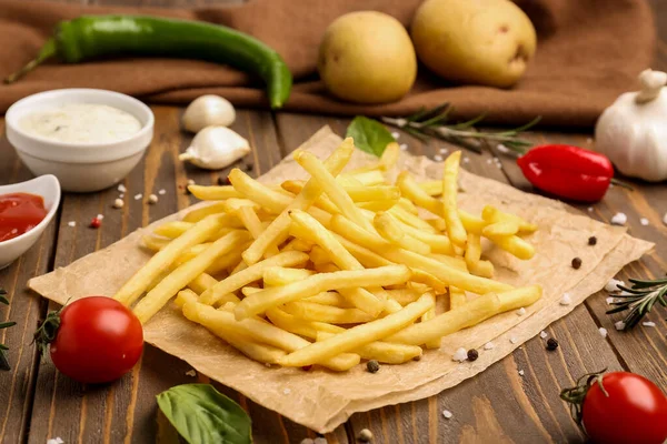 Parchment Tasty French Fries Wooden Background — Stock Photo, Image