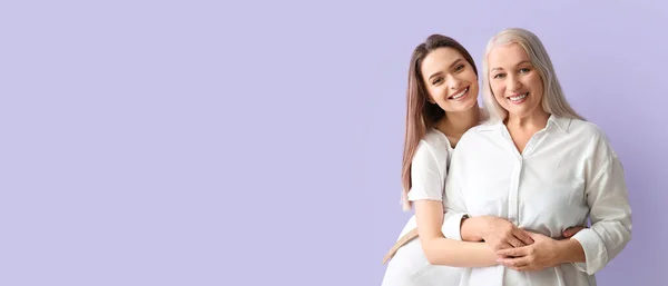 Portrait Young Woman Her Mother Lilac Background Space Text — Stock Photo, Image