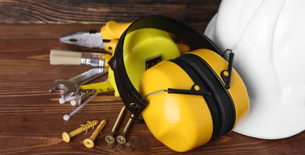Hearing Protectors Hardhat Tools Wooden Background Closeup — Stock Photo, Image