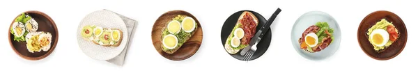 Collage Schmackhafter Toasts Mit Gekochten Eiern Auf Tellern Vor Weißem — Stockfoto