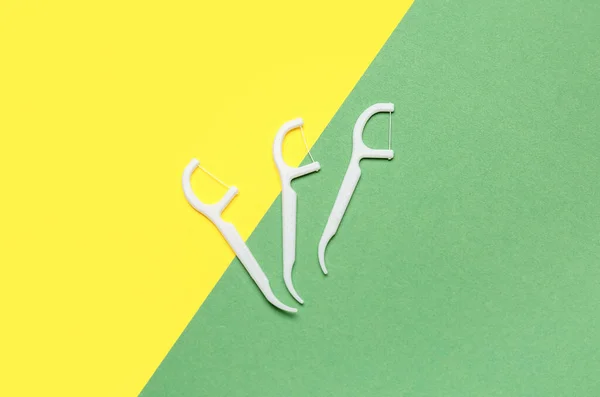 Floss Toothpicks Yellow Green Background — Stock Photo, Image