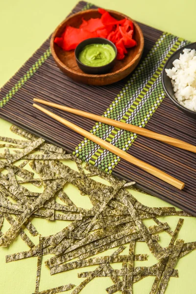 Bamboo Mat Ginger Wasabi Cut Nori Sheets Green Background Closeup — Stock Photo, Image