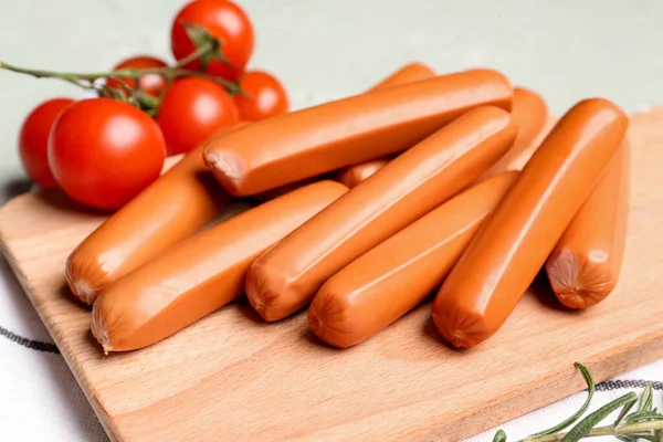 Wooden Board Tasty Sausages Light Background Closeup — Stock Photo, Image