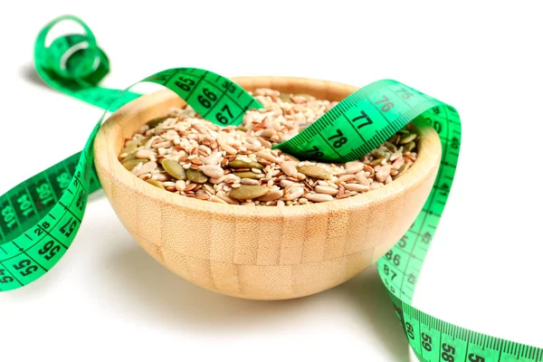Bowl Different Seeds Green Measuring Tape White Background Diet Concept — Stock Photo, Image
