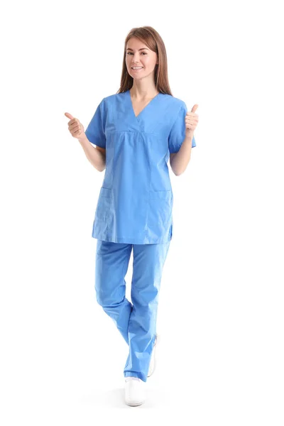 Asistente Médica Femenina Uniforme Azul Mostrando Pulgares Hacia Arriba Sobre —  Fotos de Stock