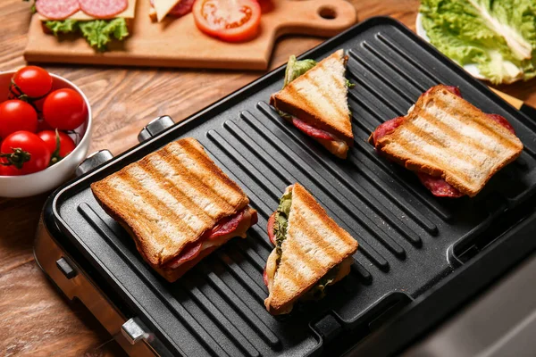 Delicious Sandwiches Modern Electric Grill Wooden Table — Stock Photo, Image