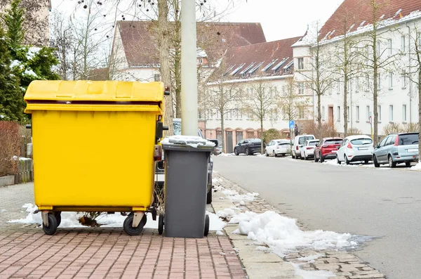 stock image View of garbage containers in city on winter day