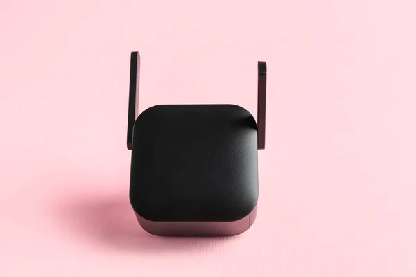 Black Wifi Repeater Pink Background — Stock Photo, Image