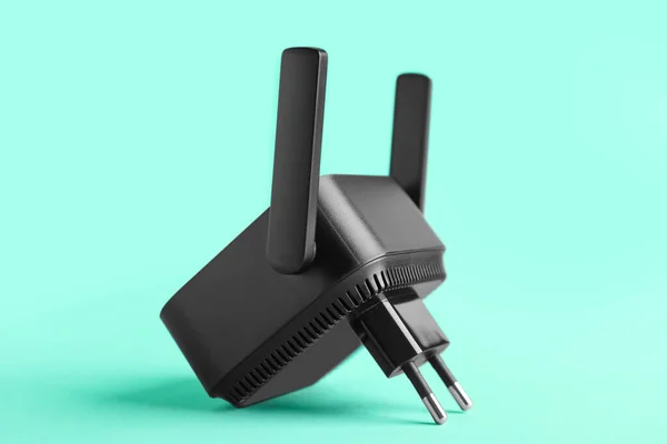 Black Wifi Repeater Turquoise Background — Stock Photo, Image