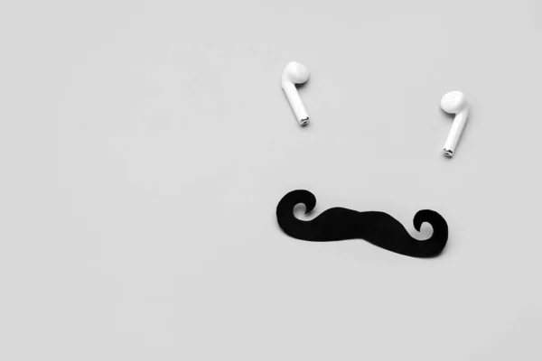 Black Paper Mustache Earphones Grey Background — Stock Photo, Image