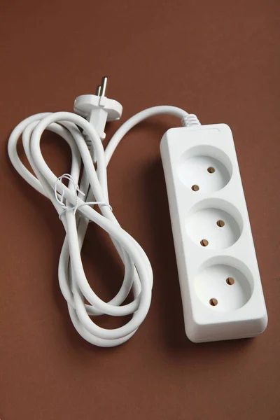 Electric Extension Cord Brown Background — Stock Photo, Image